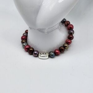 PEARLS!!!! artisan stretch bracelet.   Multi color. "Life" charm.